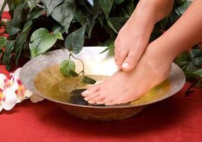 Bath with household soap against fungus feet